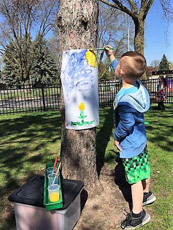 painting-outside-on-tree